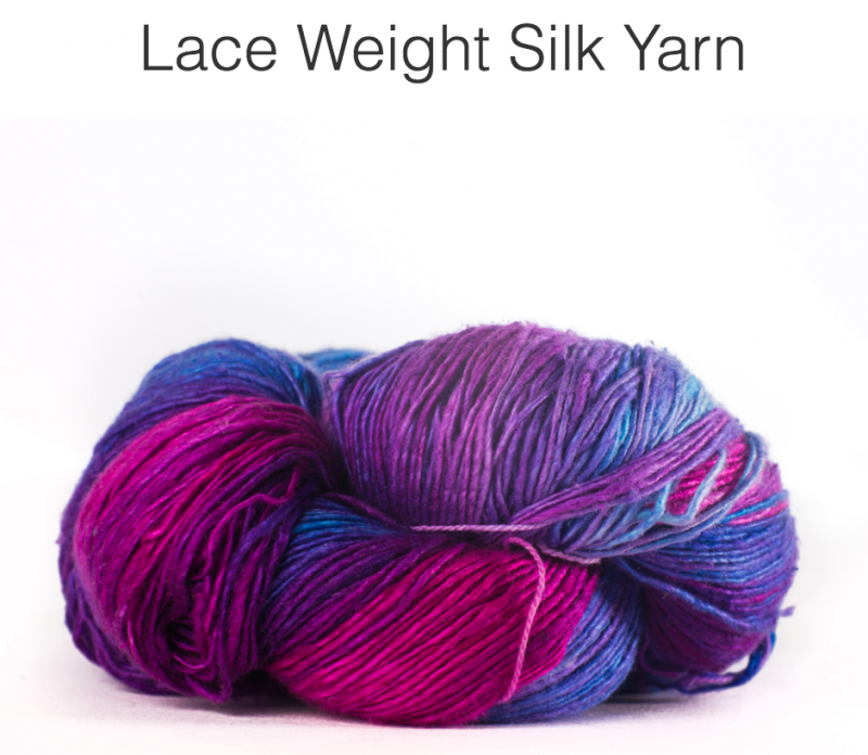 Lace weight reclaimed silk yarn in hues of fuchsia, purple and blue