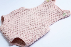 Sweet baby romper pattern knit in box stitch