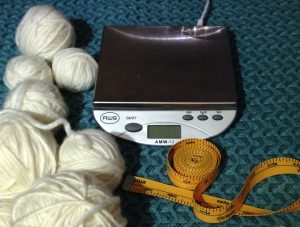 Digital scale, measuring tape and mystery yarn to determine yardage